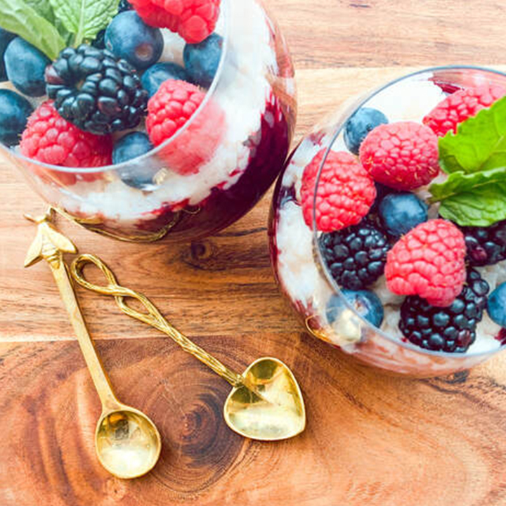 Coconut Rice Pudding and Mixed Berry Compote recipe served in glass cups