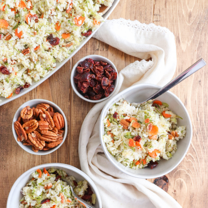 rice. cranberries and pecans displayed on a table